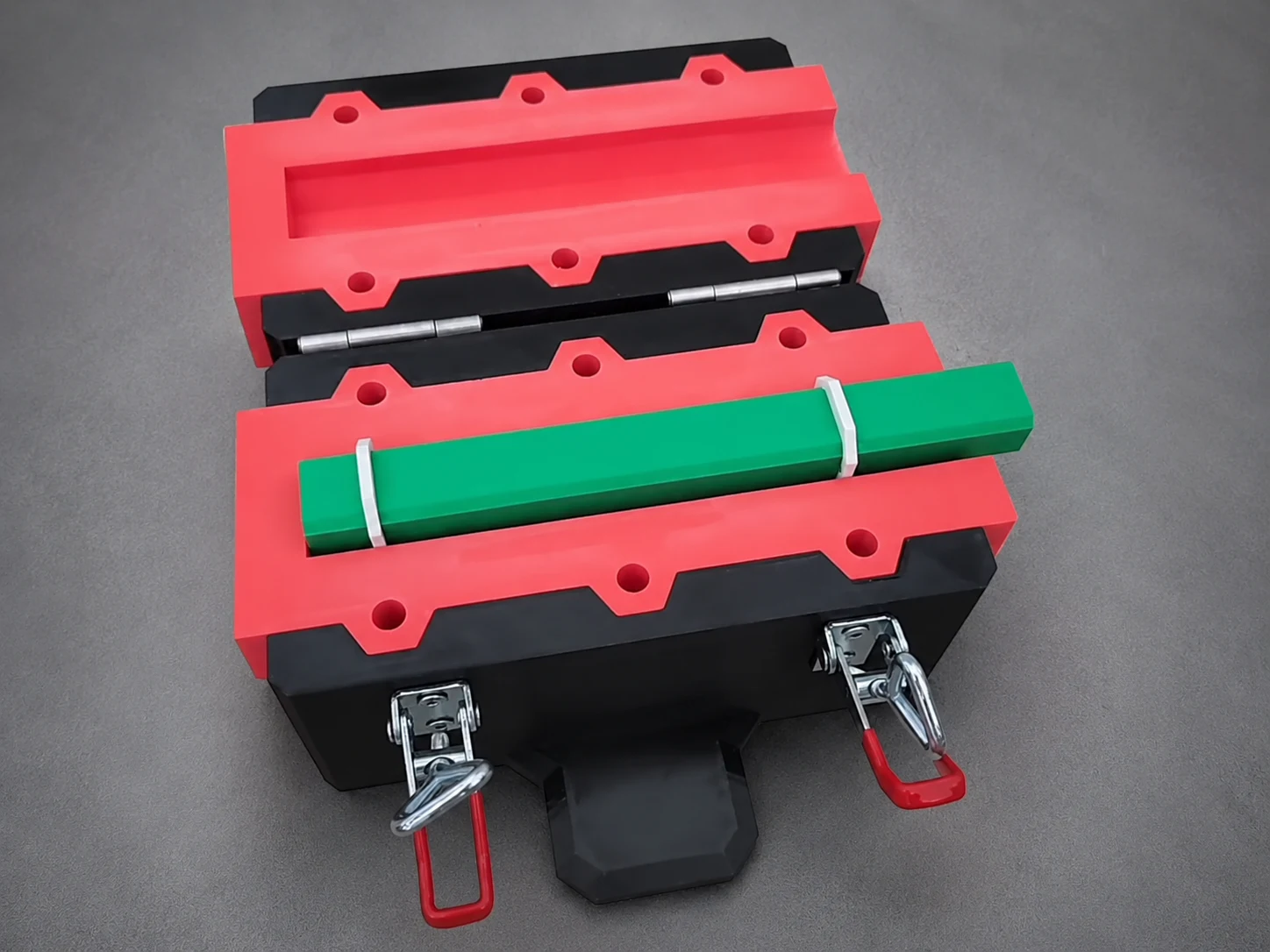 Red and black 3D-printed mold for a custom tennis racket handle